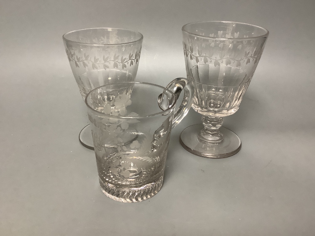 A George III engraved glass tankard and two matching Victorian rummers, tallest 15cm